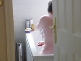 Busty curvy wifes front and rear in the bath